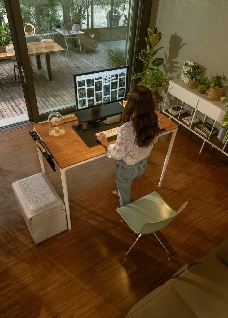 Desk with layered task and ambient lighting sources